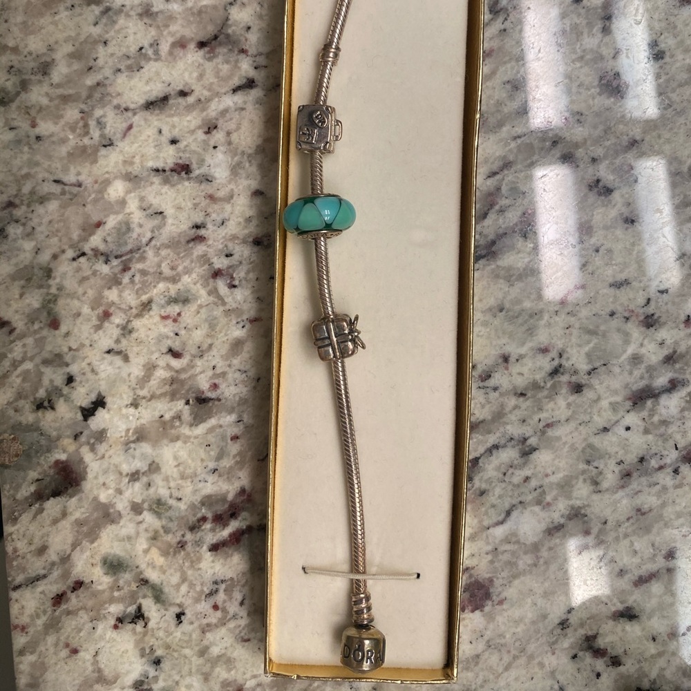 PANDORA silver charm bracelet with charms